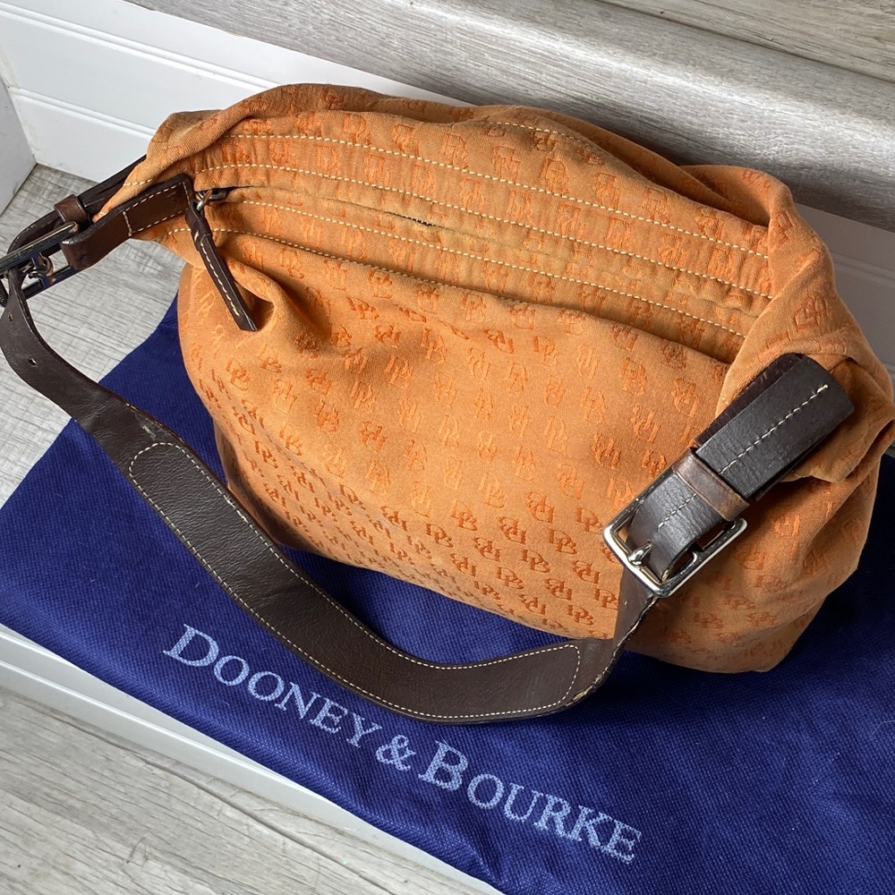 Dooney & Bourke Vintage burnt Orange over the shoulder bucket Bag